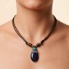 Collar Artesanal con Cuarzo Pulido y Detalles Étnicos