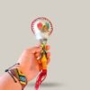Maraca Ceremonial de Cuero y Palo Santo con Tejido en Mostacilla, Plumas y Flecos