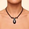 Collar Artesanal con Cuarzo Pulido y Detalles Étnicos